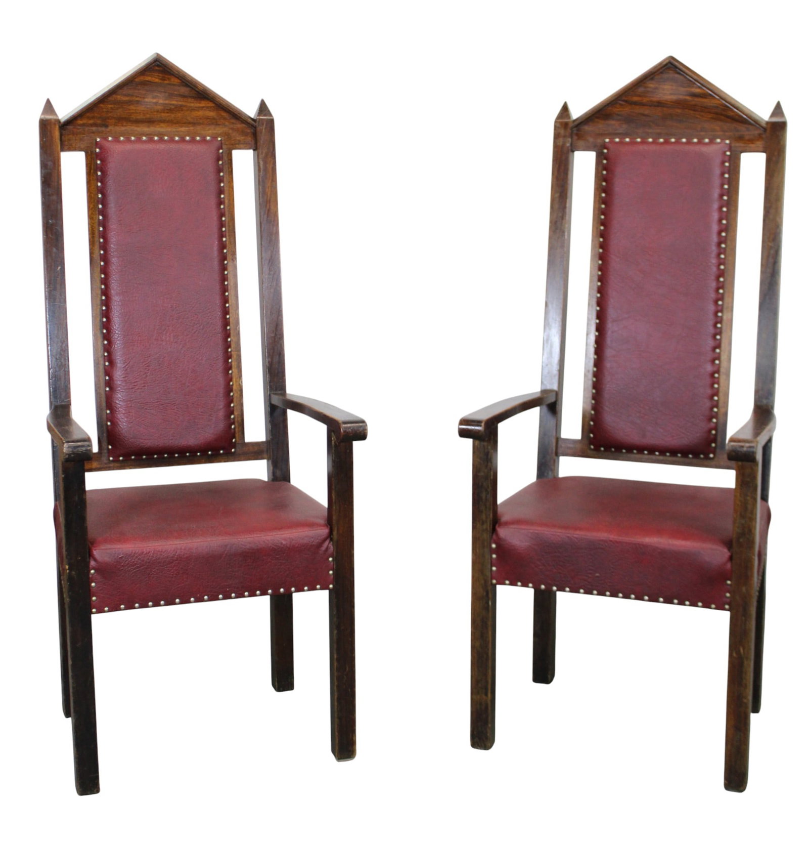 Pair of American Gothic Revival high back Deacon's chairs in oak: Pair of American Gothic Revival high back Deacon's chairs in oak with vinyl upholstery. Mid 20th century. 61 1/2"h x 24 1/4"w x 26"d Seat 21 1/4"h