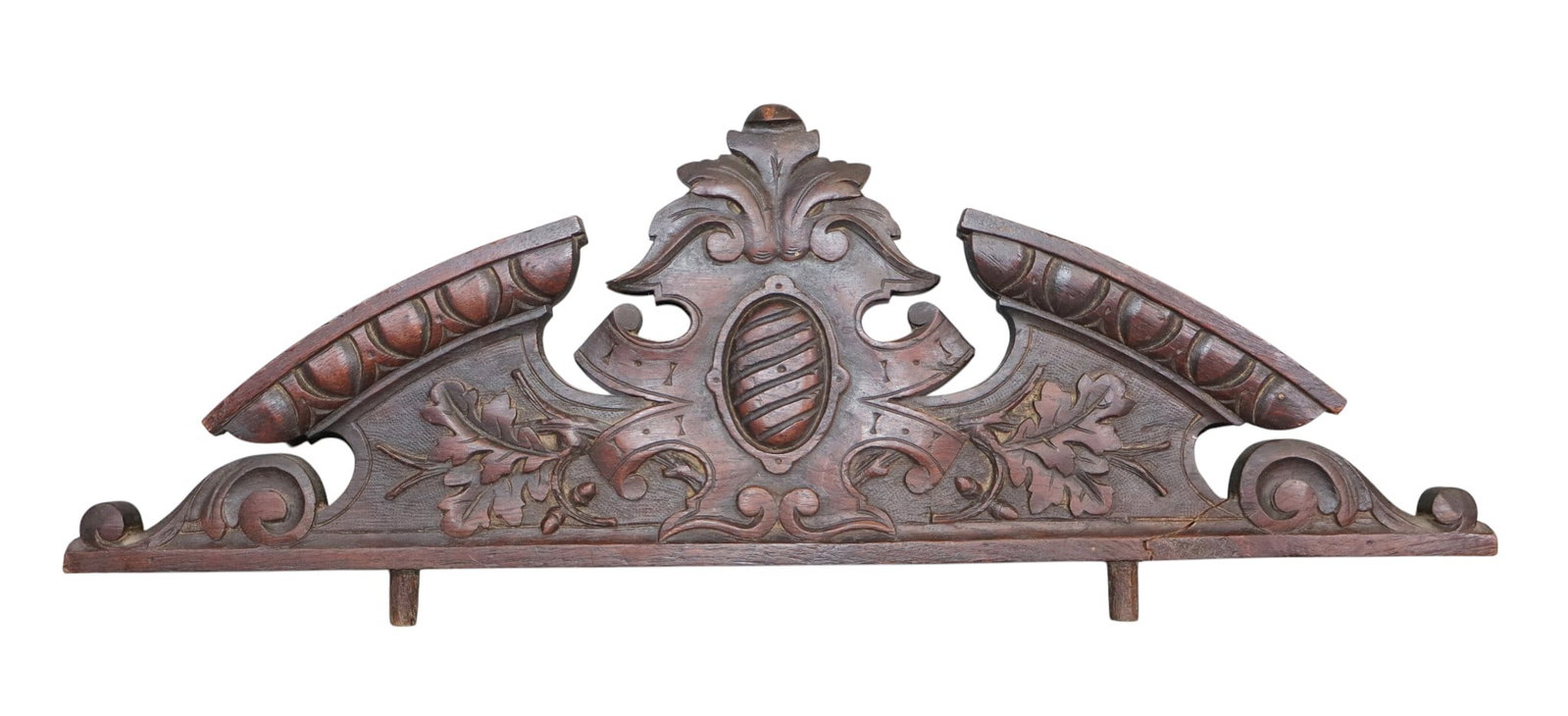 French carved oak overdoor crest with cabochon