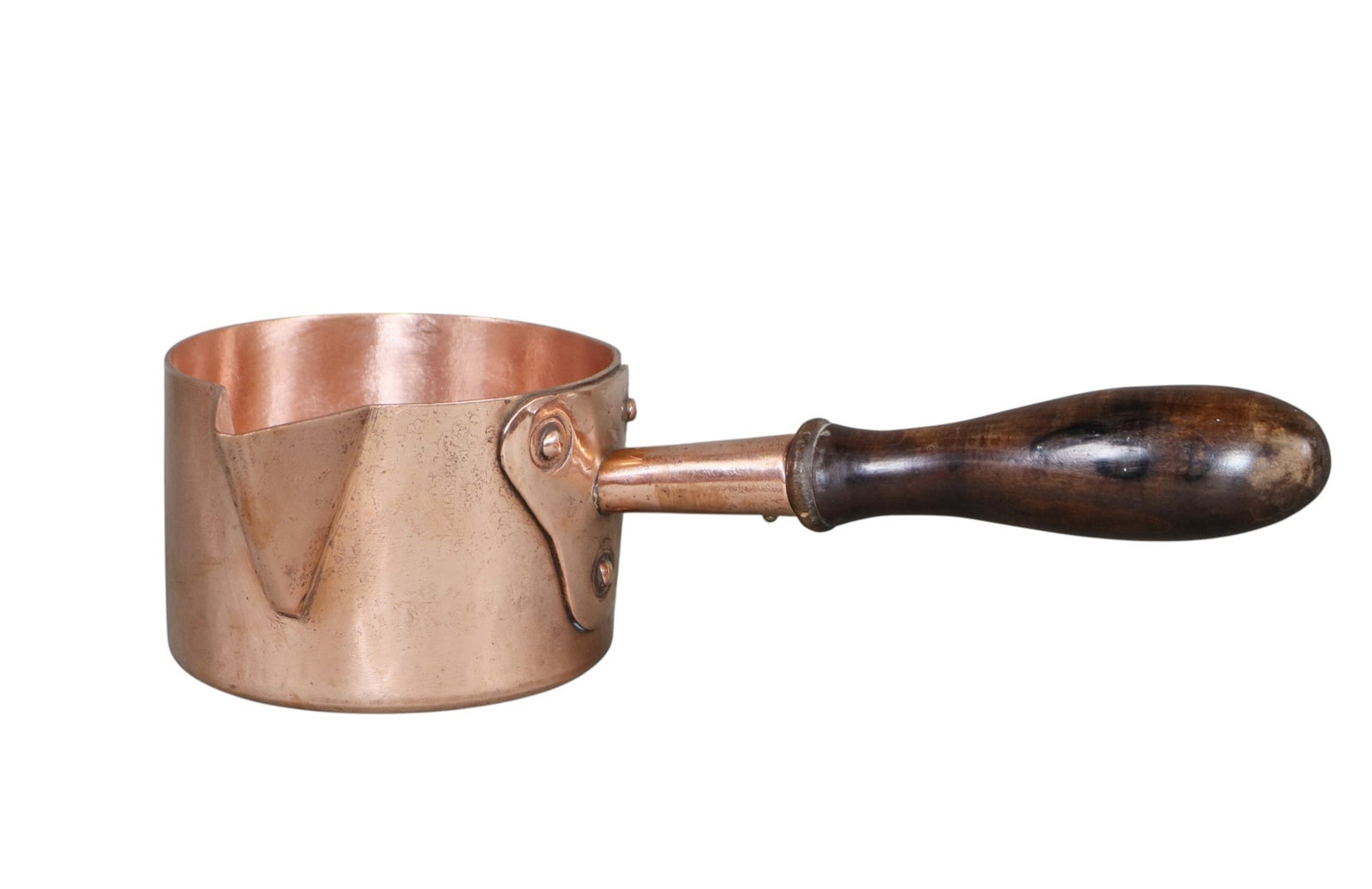 Small French E. Nihart Paris copper sauce pan with spout and wooden handle: Small French copper sugar pan with spout and wooden handle. Stamped E. Nihart chaudronnier 5 Rue Brey Paris. 3"h x 11"w x 5 1/2"d x 4 1/4"dia. Weight: 2lbs
