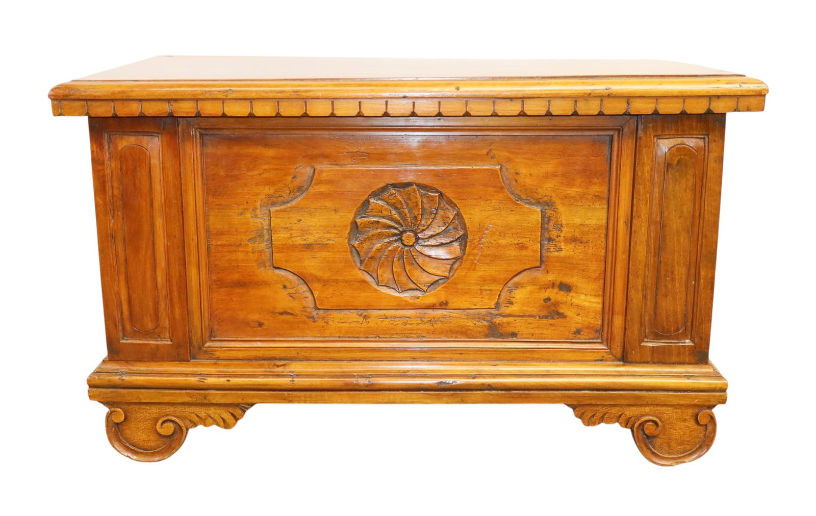 Italian trunk in walnut: Italian trunk in walnut with scallop edge and relief carved sun. 18 1/2"h x 32"w x 16"d