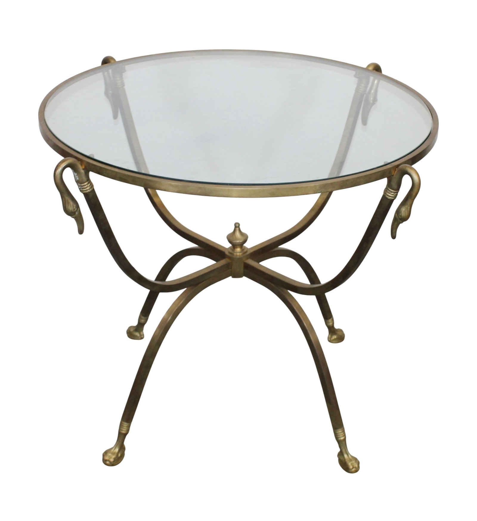 Italian round brass table with glass top: Italian round brass table with glass top and swan heads. 23 3/8"h x 20 3/4"w x 20 3/4"d