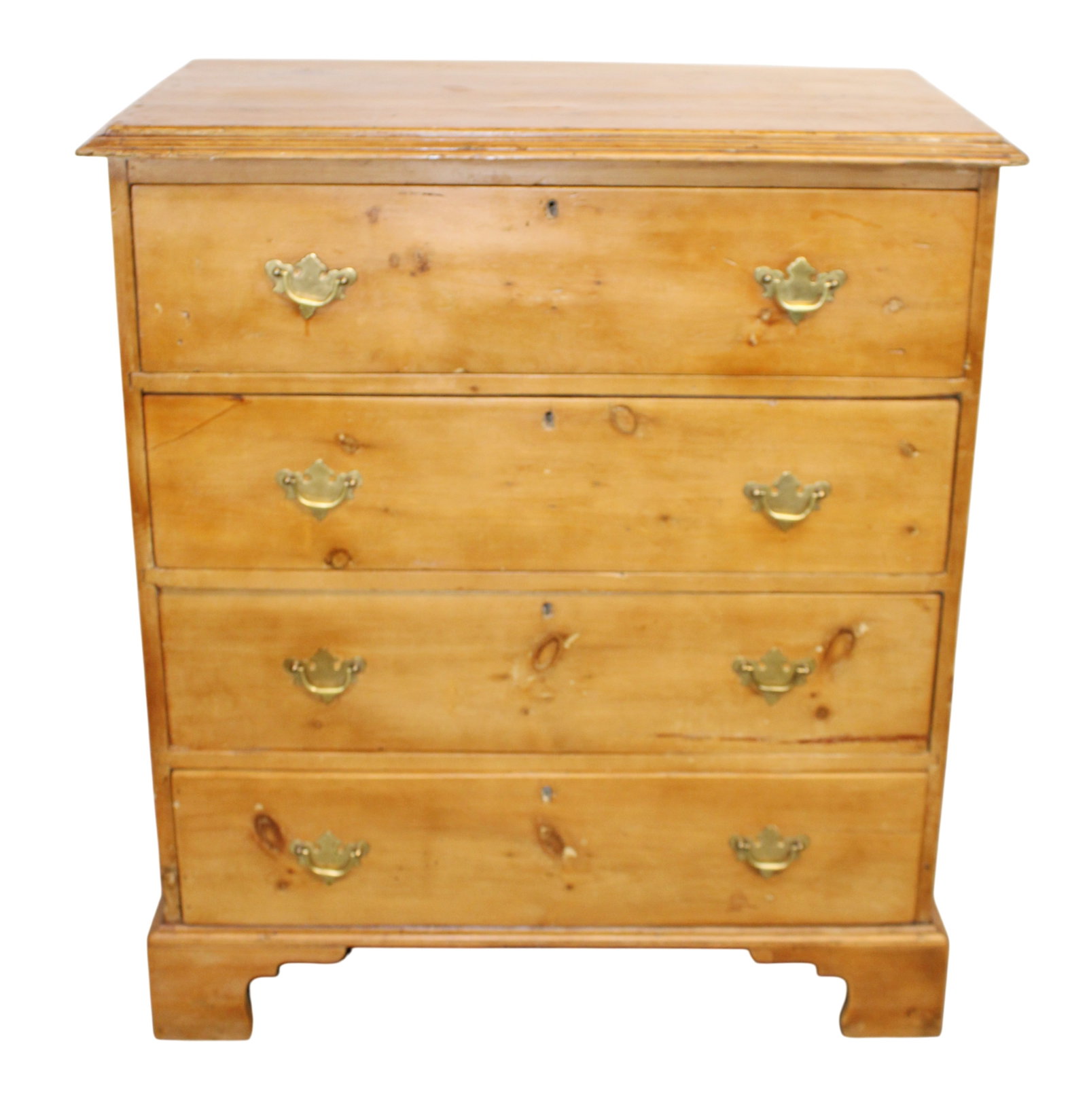 English 4 drawer chest in pine on bracket feet: English 4 drawer chest in pine on bracket feet. Late 19th century. 41"h x 36"w x 20"d