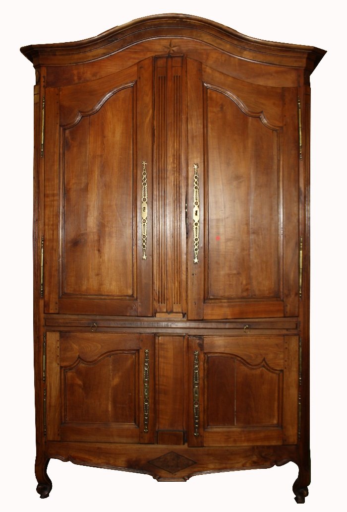 18th c French Provincial buffet deux corps: in cherry with inlaid compass rose, pull-out tray and brass hardware with star detail. 62"w x 97 1/2"h x 28 1/2"d