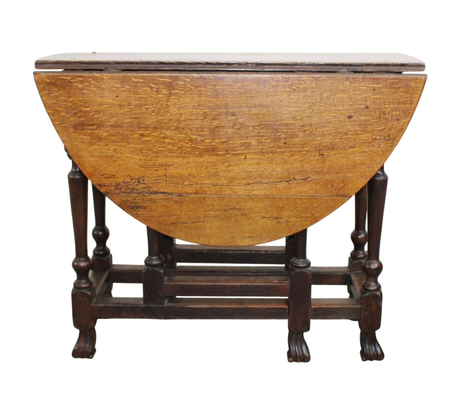 English oak drop side gate leg table: English oak drop side gate leg table . 19th century. Folded: 29"h x 36 1/2"w x 14 1/2"d, open: 45"l