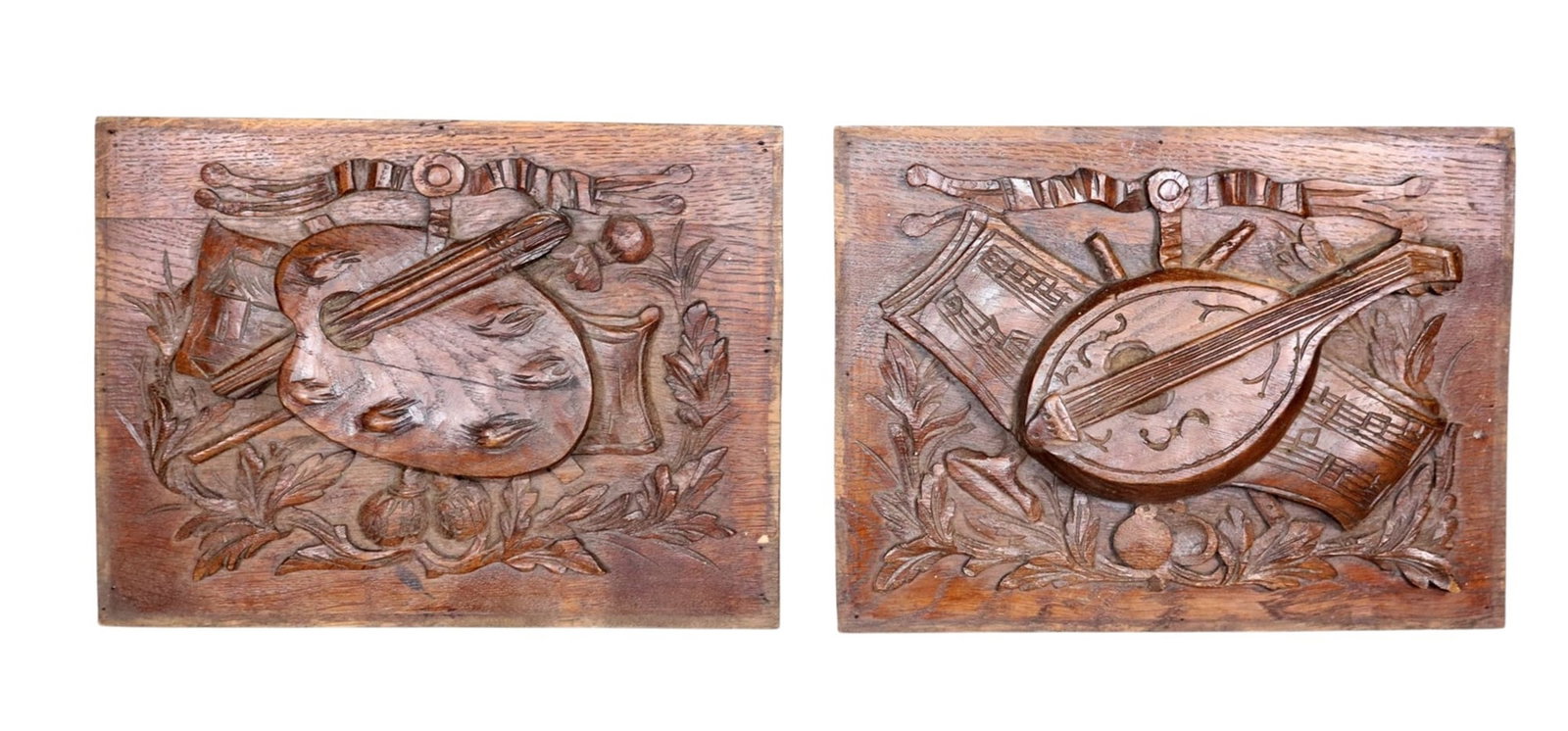 Pair of French relief carved oak panels in an art and musical motif: Pair of French relief carved oak panels in an art and musical motif. Late 19th century. Each: 9 1/4"h x 12 1/8"w x 1"d. Weight: 3lbs total