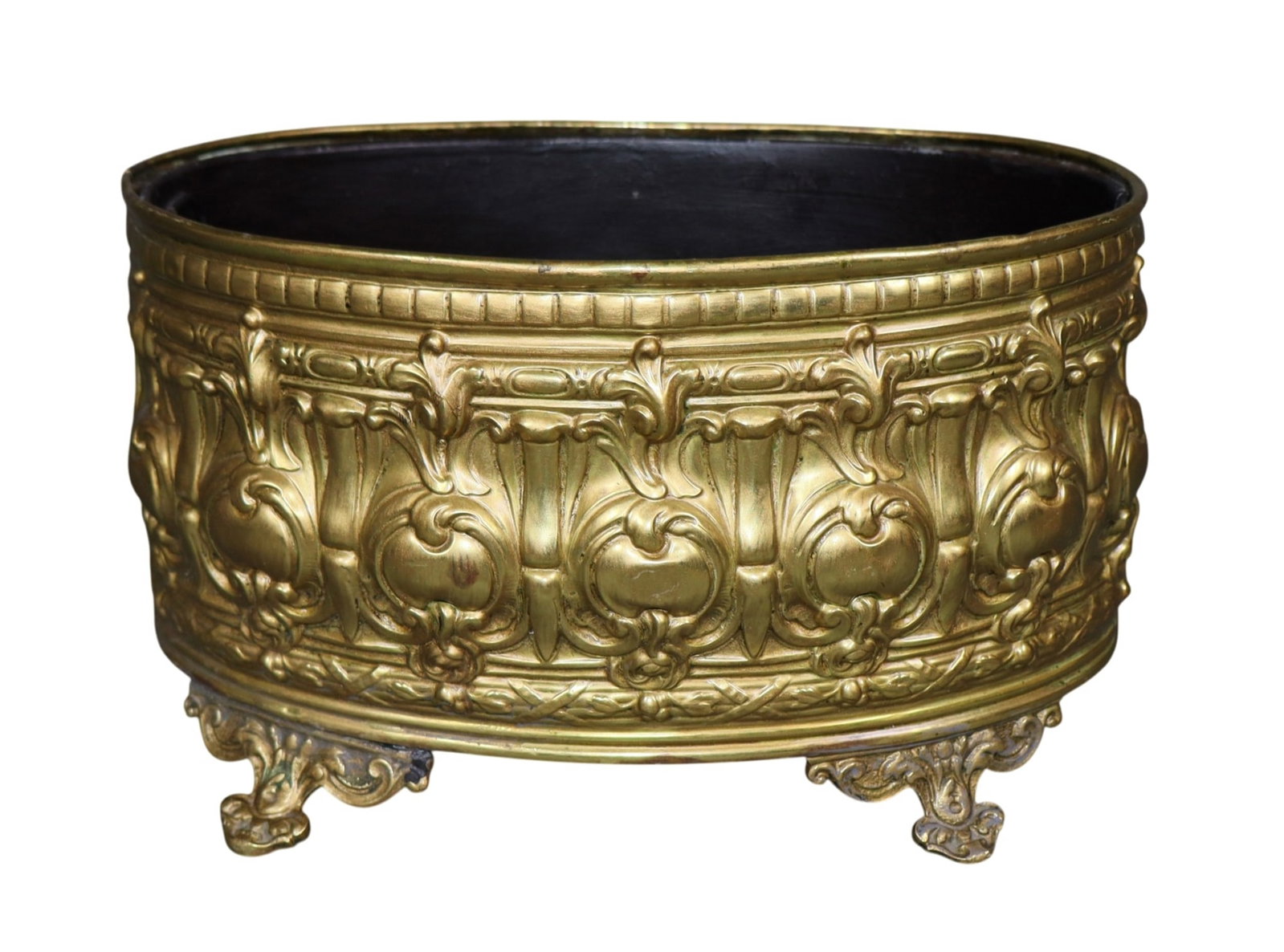 French embossed brass jardiniere: French embossed brass jardiniere. Early 20th century. 6"h x 10 1/4"w x 6 1/4"d. Weight 2lbs