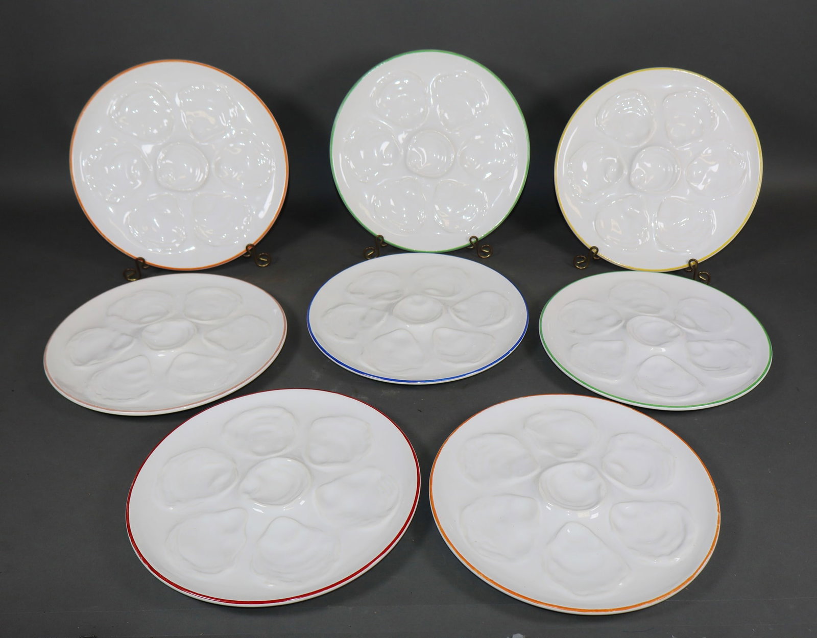 Set of 8 French white oyster plates with colored borders: Set of 8 French white oyster plates with colored borders. 9 5/8"dia Weight: 12lbs