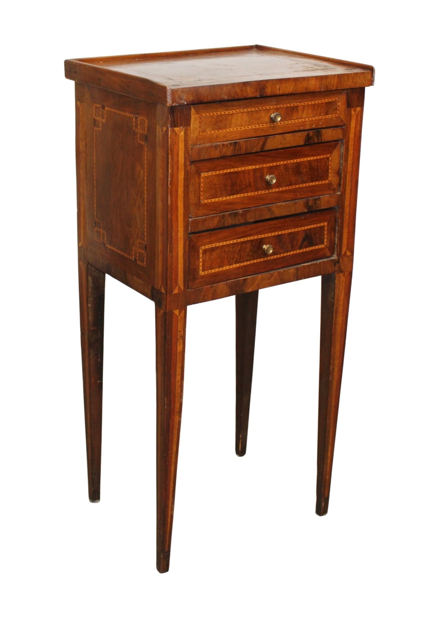 French Louis XVI chevet in walnut with marquetry: French Louis XVI 3 drawer chevet in walnut with marquetry. Finished all 4 sides. 19th century. 30"h x 14 5/8"w x 11 5/8"d