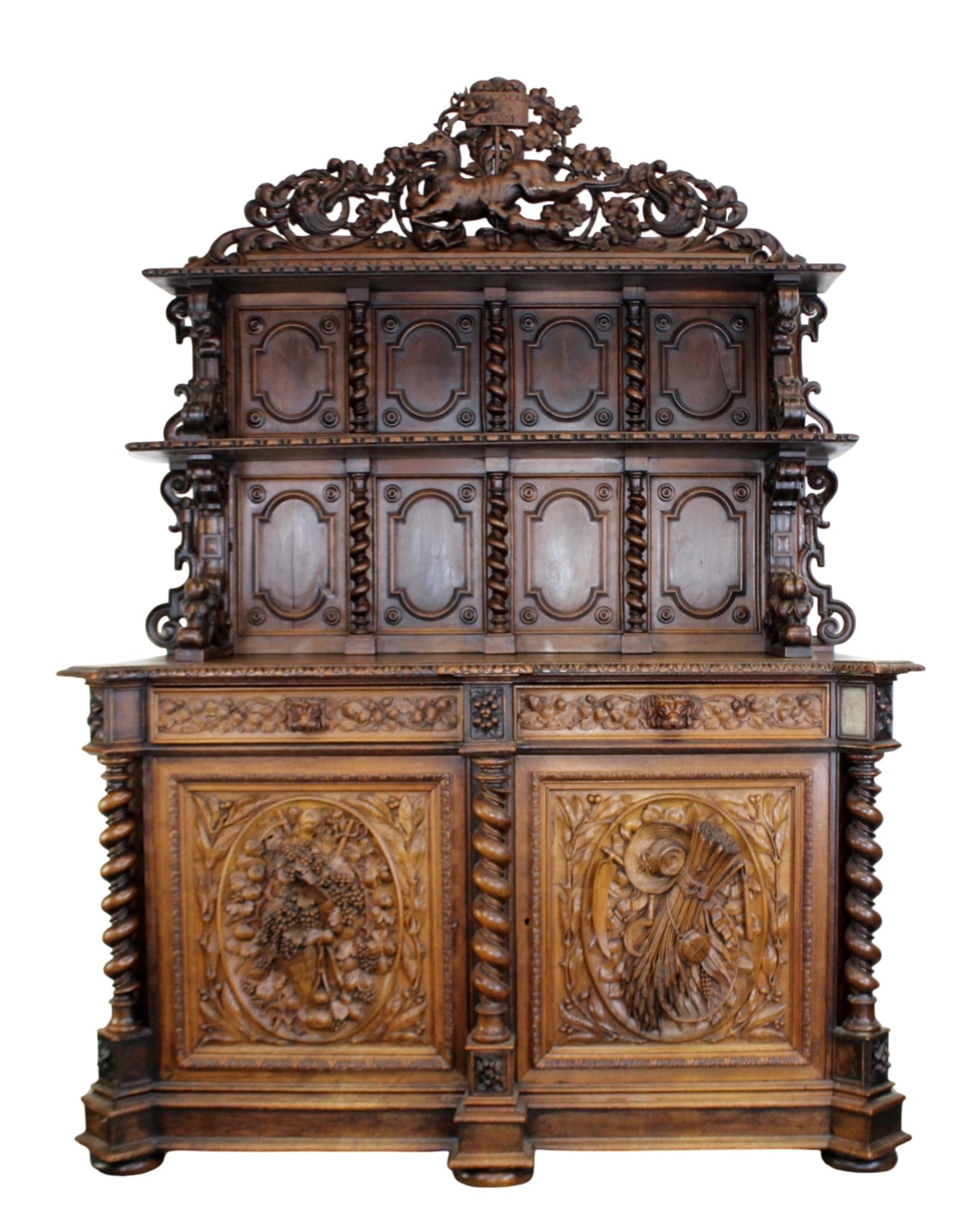 French buffet St Hubert in walnut with carved panels, barley twist columns, dog head pulls, and (1 of 17)