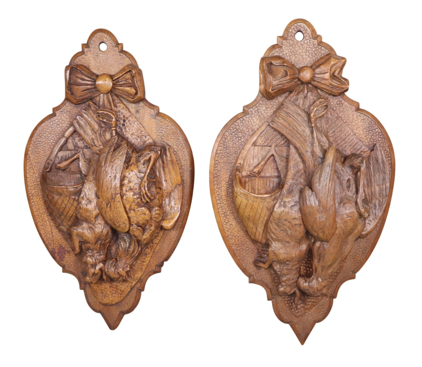 Pair of French Black Forest carved walnut trophy plaques with game and ribbon: Pair of French Black Forest carved walnut trophy plaques with game and ribbon. Late 19th century. 17 3/8"h x 9 3/4"w x 2 1/2"d Weight: 4lbs total