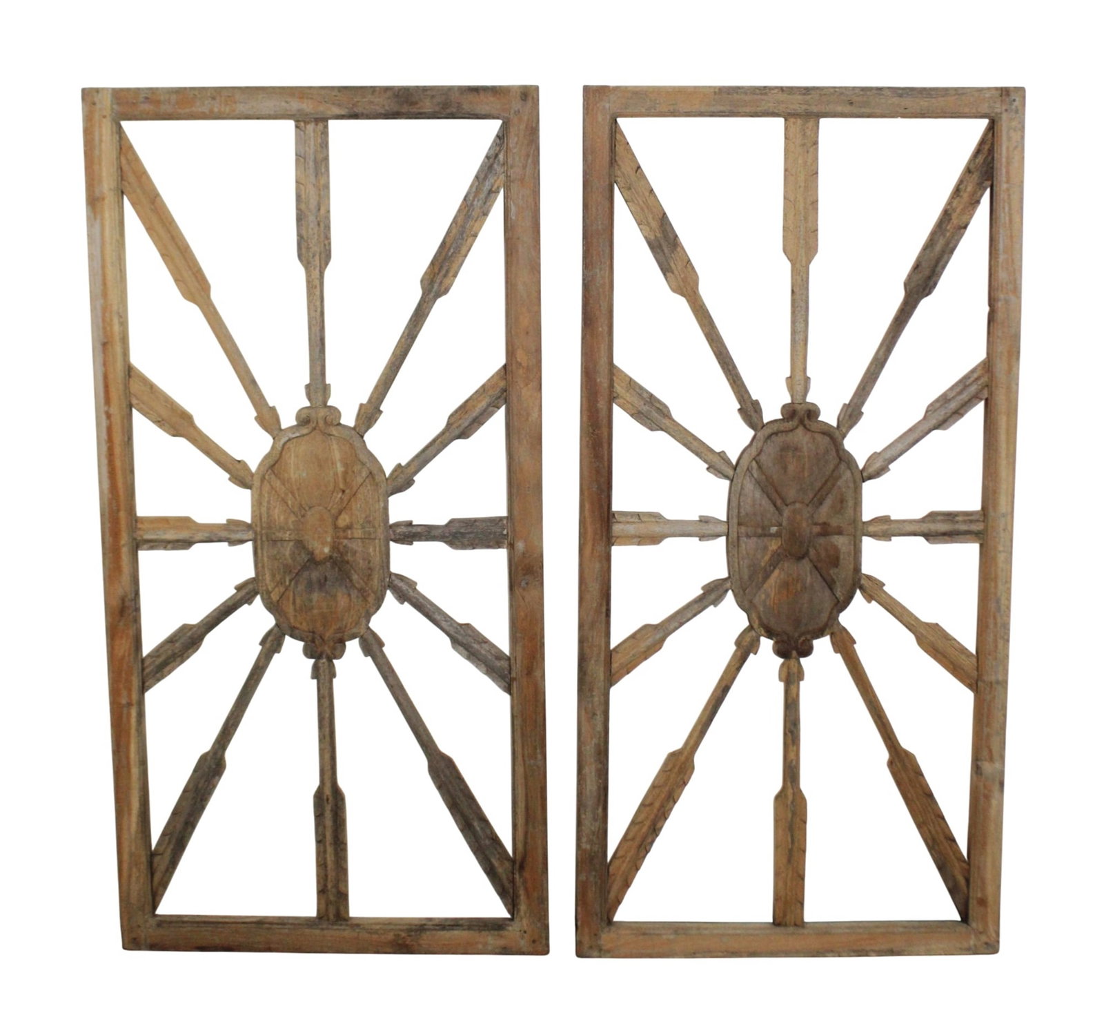 Pair of French carved and painted panels with arrows: Pair of French carved and painted panels with arrows. Early 20th century, 50 1/2"h x 20 1/4"w