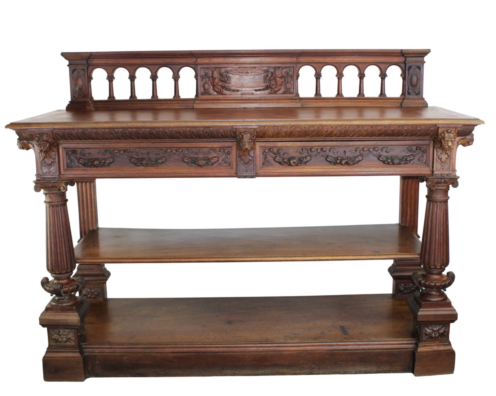French Renaissance Revival carved walnut tiered server: French Renaissance Revival carved walnut tiered server. With lion heads and parquet top. 2 drawers. Late 19th century. 53 3/4"h x 72 3/4"l x 26"d