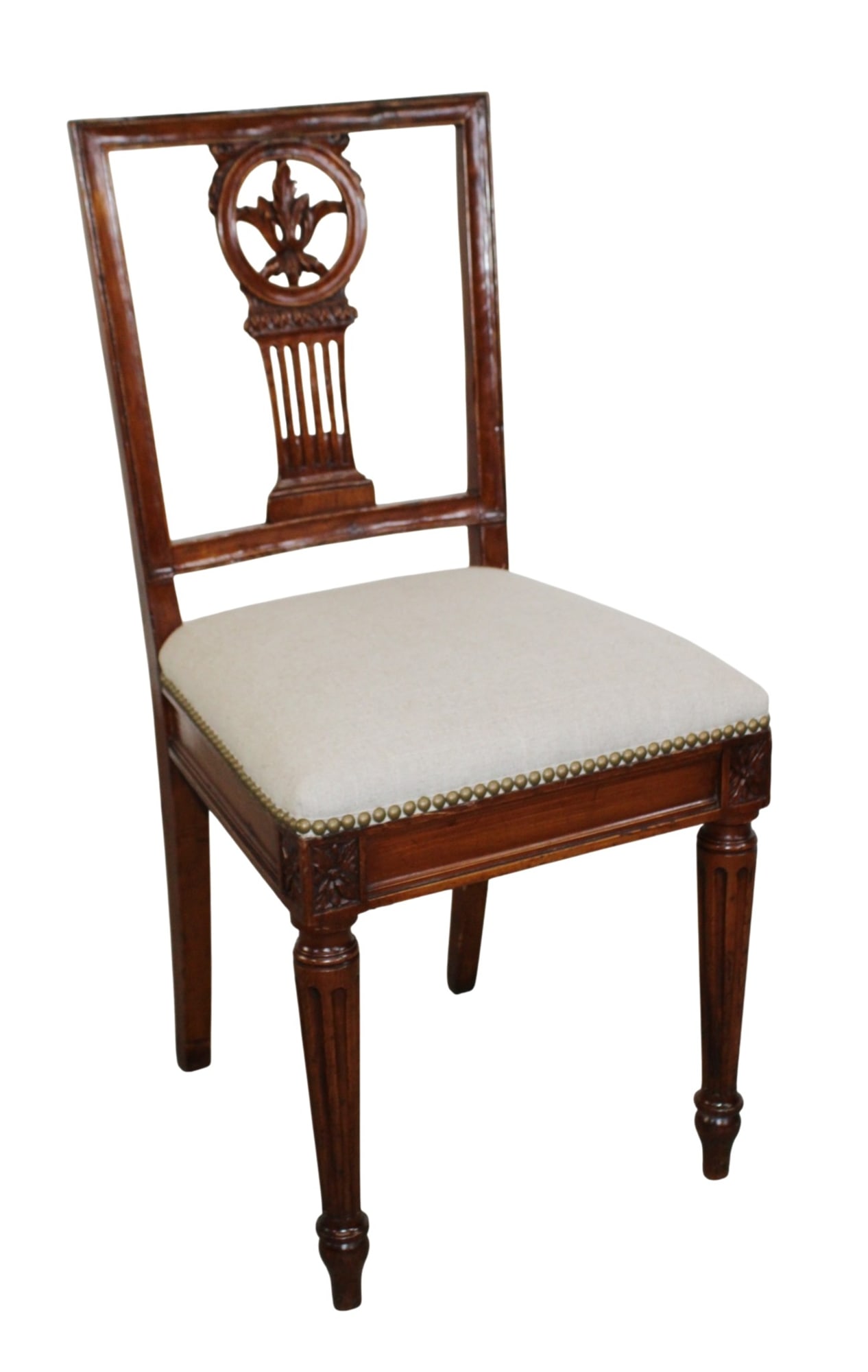 Italian neoclassical side chair in walnut with pierce carved back: Italian neoclassical side chair in walnut with pierce carved splat back and fluted legs. 19th century. 34 1/4"h x 16"w x 15"d, seat height: 18"
