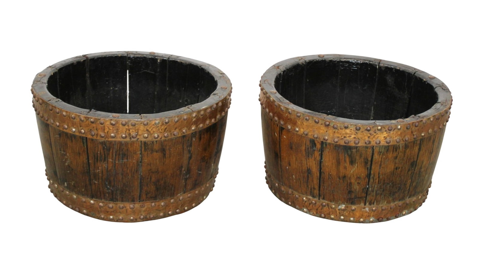 Pair of banded wooden barrel planters: Pair of banded wooden barrel planters. Each 10 1/4"h x 17 1/2"dia