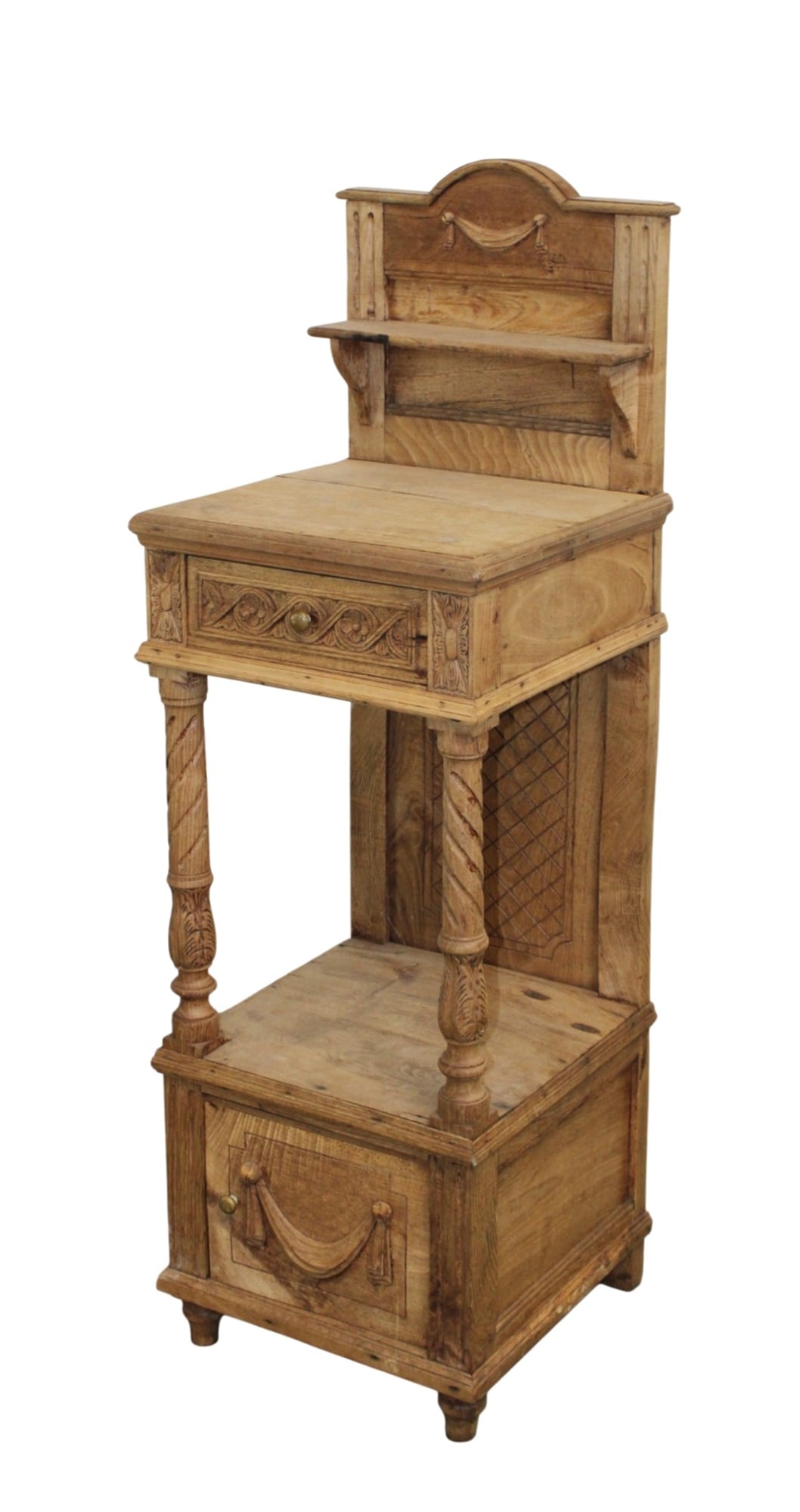French chevet in bleached oak with relief carved swags: French chevet in bleached oak with relief carved swags. Late 19t century. 47 1/8"h x 15"w x 14 7/8"d