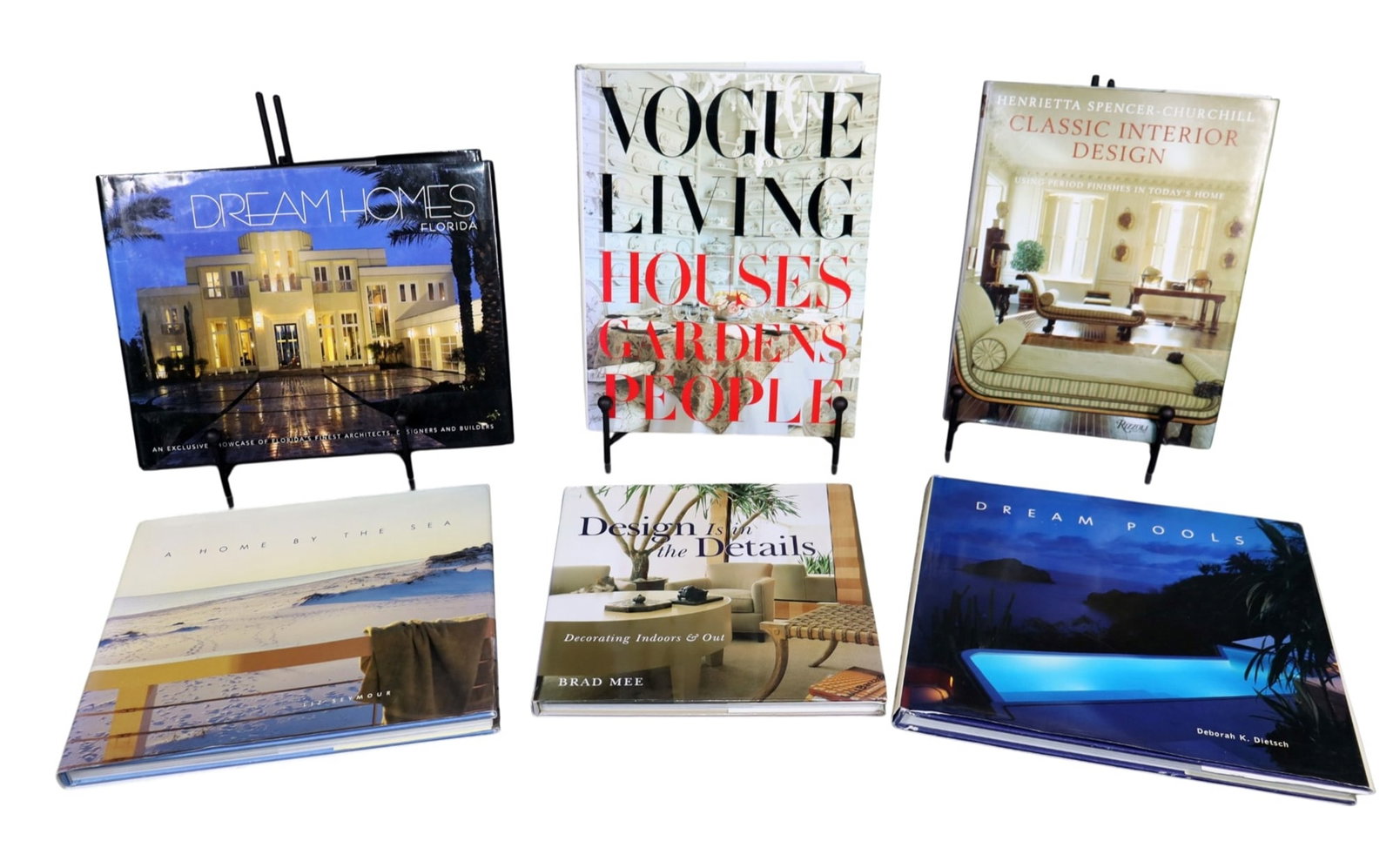 Set of 6 books on American design: Set of 6 books on American design. "Dream House", "Vogue Living", "A Home by the Sea", "Design is in the Details", "Dream Pools". 12 7/8"h x 9 3/4"w - 10 1/4"h x 10 3/8"w. Weight: 23lbs total