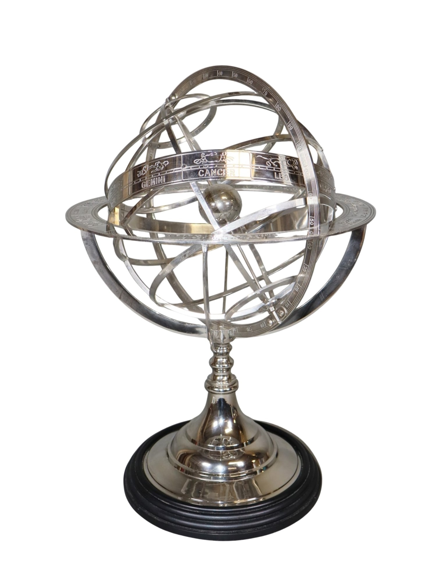 Eichholtz astrological armillary movie prop in nickel over bronze: Eichholtz astrological armillary movie prop in nickel over bronze. 20"h x 13 1/4"dia. Weight: 11lbs