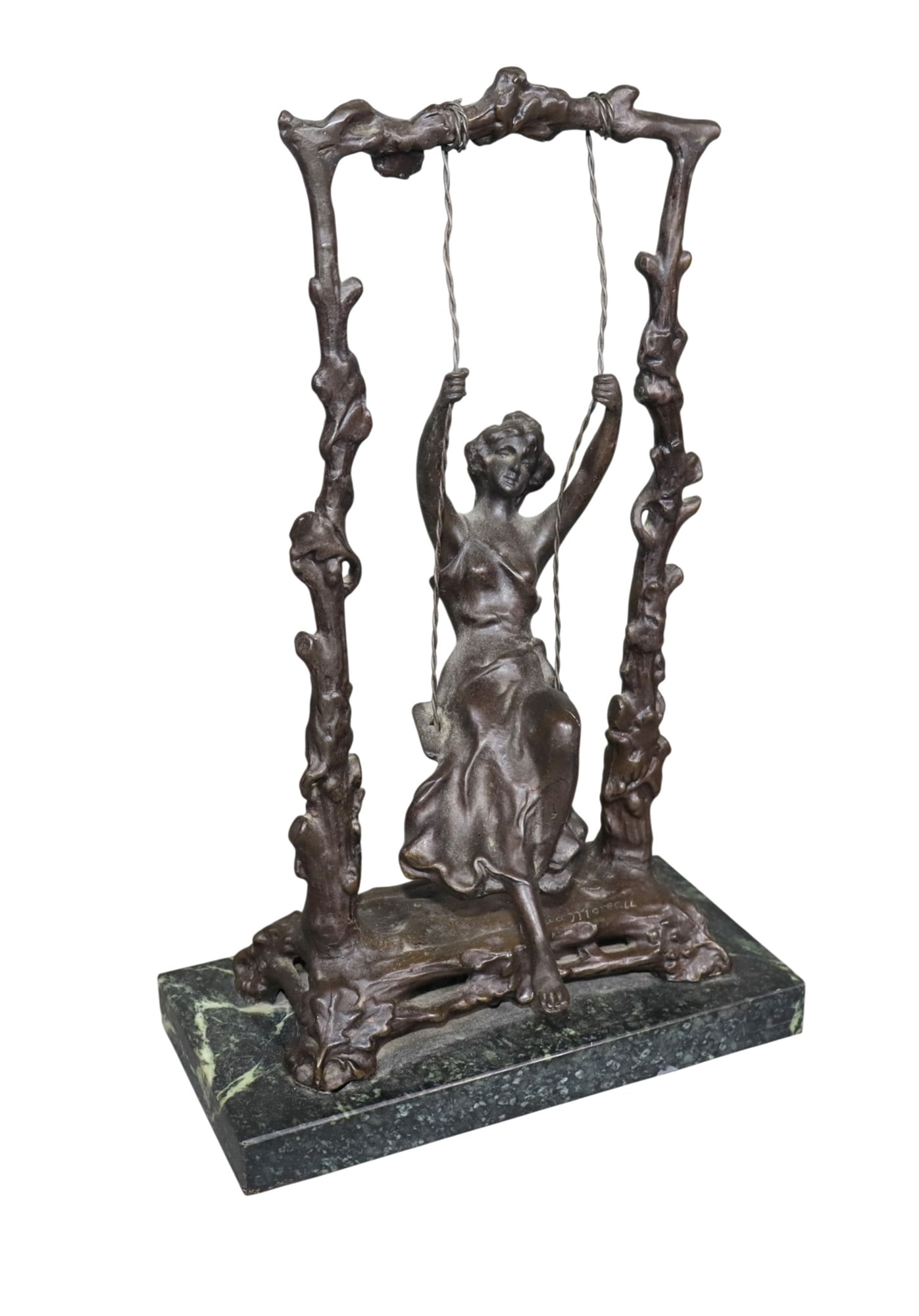 Bronze sculpture of woman on swing after Auguste Moreau: Bronze sculpture of woman on swing after Auguste Moreau. Late 20th century. 11"h x 6 3/4"w x 3 1/2"d Weight: 4lbs