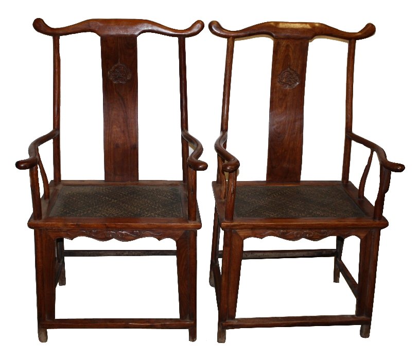 Pair of Chinese Huanghuali hooped back chairs: with rattan seats and joined stretcher. 46 3/4"h x 25"w x 19"d