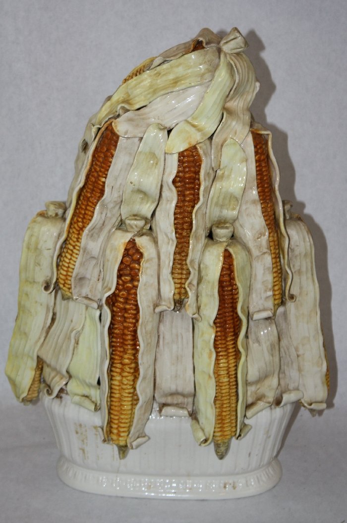 Italian glazed ceramic centerpiece: bowl fileld with ears of corn. Marked on bottom 223 Italy. 19 1/4"h x 13"w x 7"d
