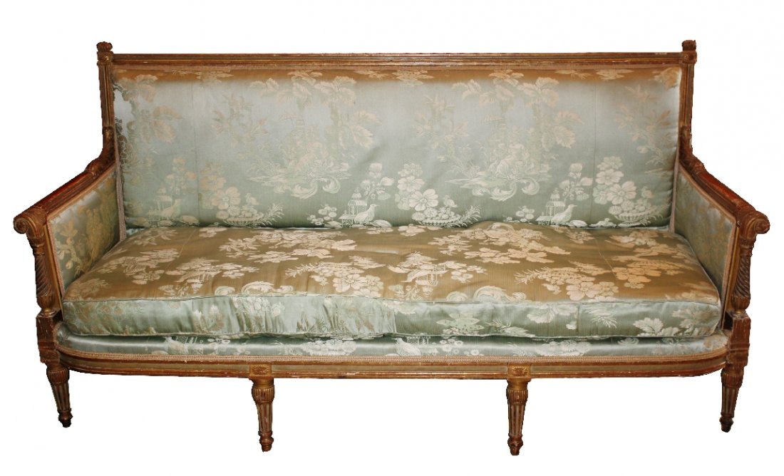 French early 19th century Louis XVI settee: carved and gilded frame. Upholstered with Scalamandre silk. Underside has old paper label marked Douanes Francaises Paris. Service des Expositions. 39 1/2"h x 78"l x 25"d