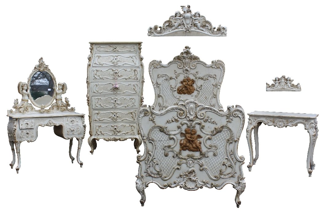 Italian 19th c Rococo bedroom suite heavily carved and: painted with relief carved cherubs. Set includes bed with canopy, desk with canopy, vanity with mirror & tall chest. Bed- 67 3/8"h x 42 3/8"d x 79 7/8"w. Large canopy-41 5/8"w x 16 3/8"h x 16 1/8"d. D