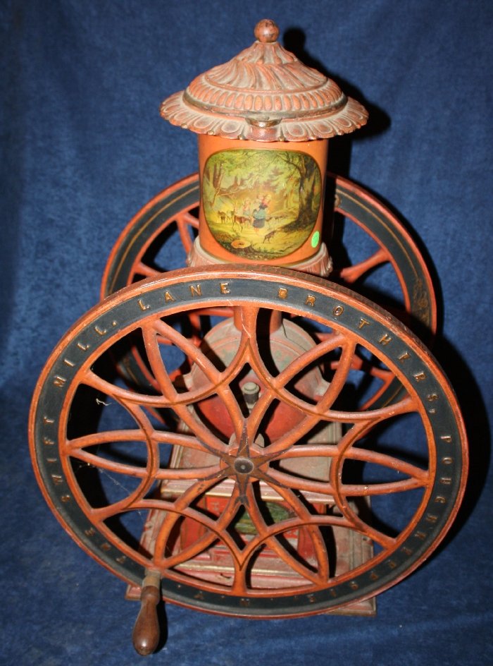 The Swift Mill Lane Brothers #15 coffee grinder: Painted. American. Early 20th century. With embossed 15. 29 1/2"h x 19 1/2"w x 18 1/4"d