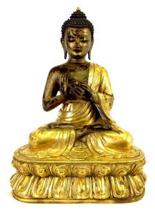 Qing Dynasty Fine Chinese Gilt Bronze Buddha: Qing Dynasty Very Fine Chinese Gilt Bronze Buddha. Seated in dhyanasana dress. Hands in Dharmachakra mudra. The serene face expression beneath a large protruding urna set amidst the whorls of hair. Se