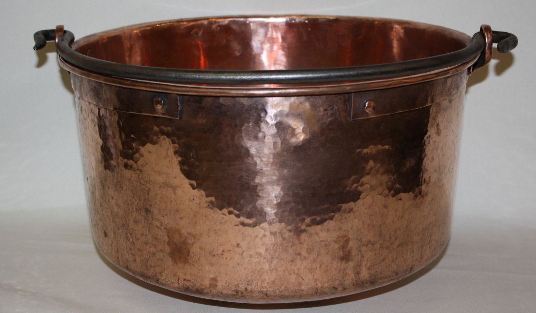 French hand hammered copper pot with iron: handle. Early 19th century. 10 3/8"h x 16 1/8"dia