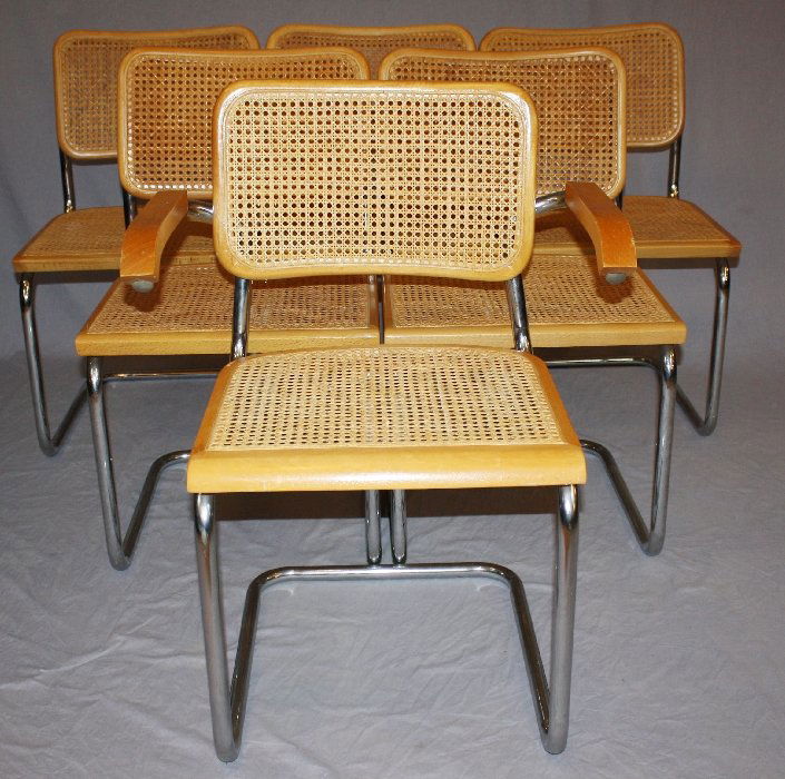Set of 6 Breuer chairs natural & chrome frame: with cane seats & backs. Made in Italy after design by Marcel Breuer. 1arm & 5 sides. 31 5/8"h x 18 5/8"d x 18 1/4"w