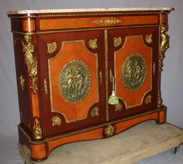 Bronze mounted cabinet with caryatids & marble: ormolu mounts and embossed brass panels. 39 1/4"h x 44 5/8"w x 16 5/8"d