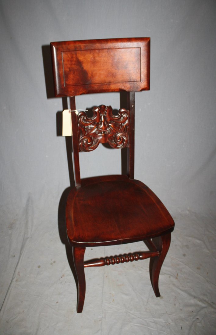 Antique carved walnut chair with North Wind mask: Antique carved walnut chair with North Wind mask. 39 3/4"h