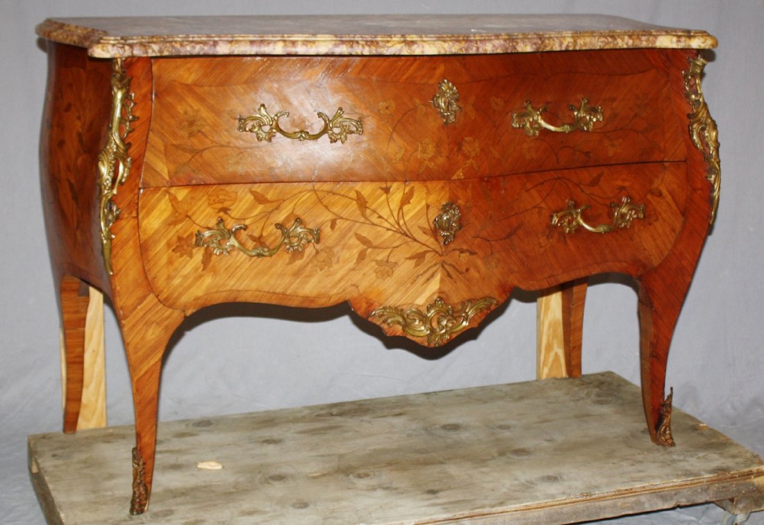 French Louis XV floral marquetry commode: French Louis XV floral marquetry commode with marble top and ormolu. Late 19th century. 34"h x 50 1/8"w x 23"d