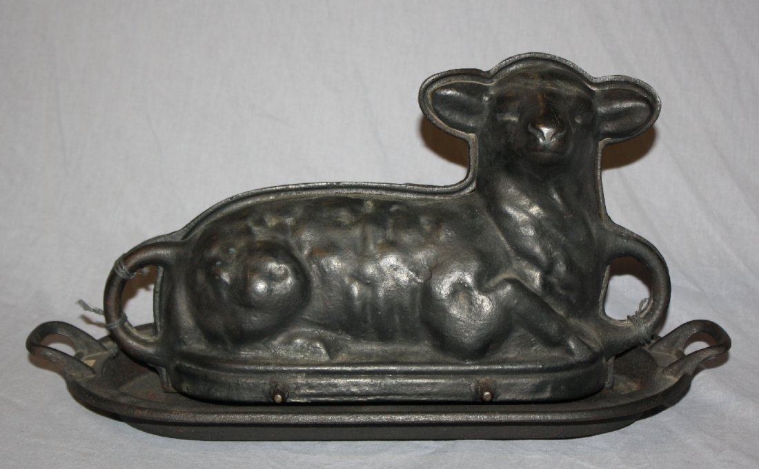 Antique American cast iron sheep mold: Griswold. 9"h x 17 1/2"l x 7 1/4"d