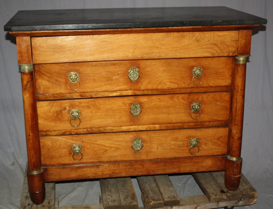 French Empire marble top commode in elm.: With lion head pulls. 36 1/2"h x 47 1/2"w x 23 3/4"d