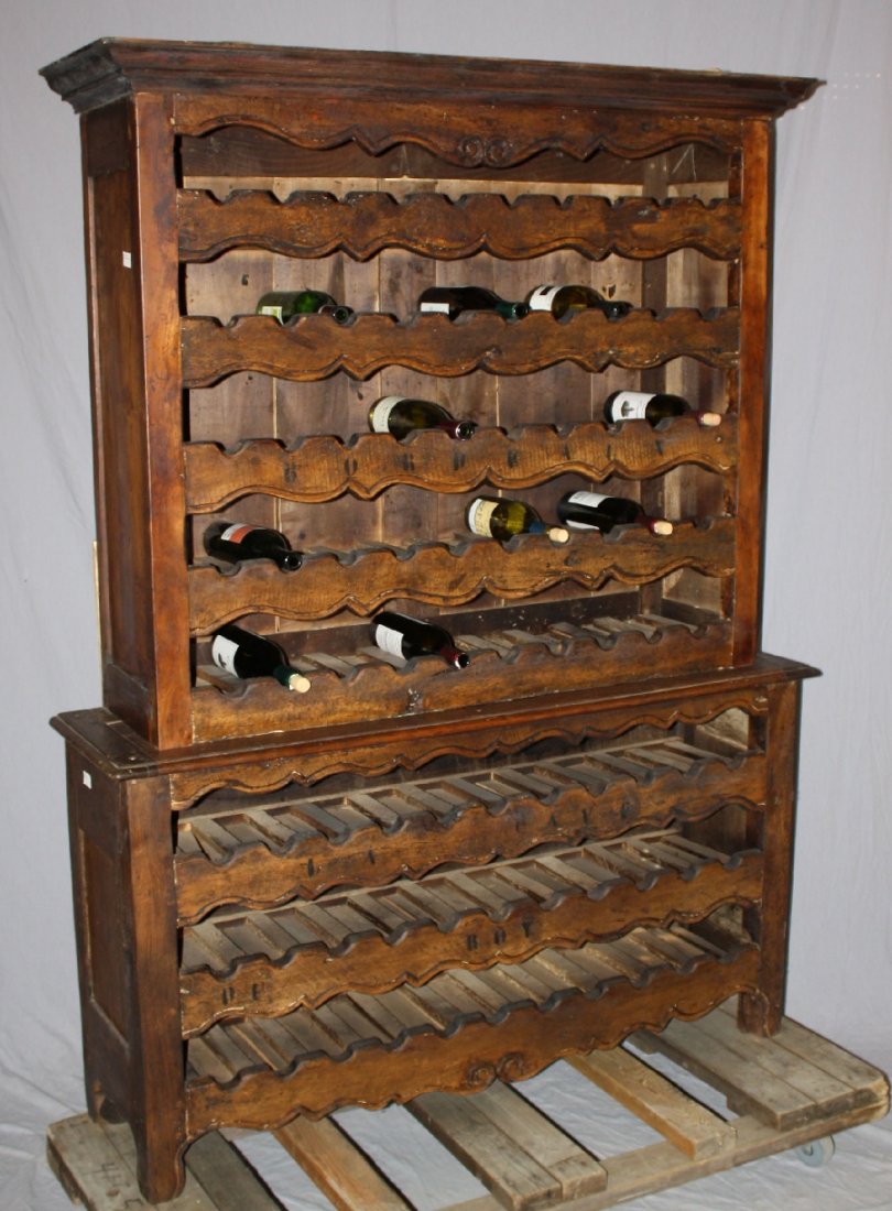 French Provincial wine cabinet in walnut: 70 3/4"h x 52 5/8"w x 14 7/8"d.