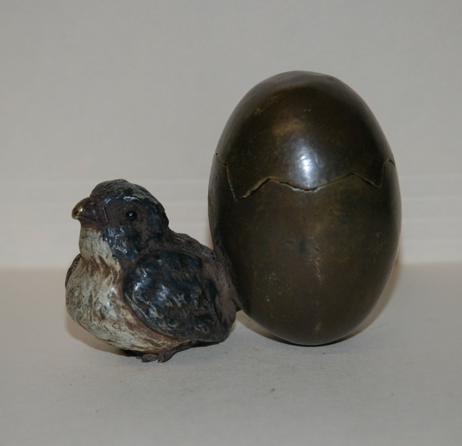 Cold painted bronze statue of bird with an egg: marked 1523. 3"h x 3 1/2"w
