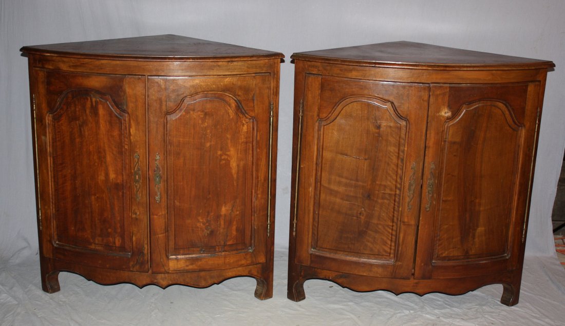 Pair of French Louis XV corner cabinets: A pair of French Louis XV style walnut corner cabinets. 43"h x 41 3/8"w
