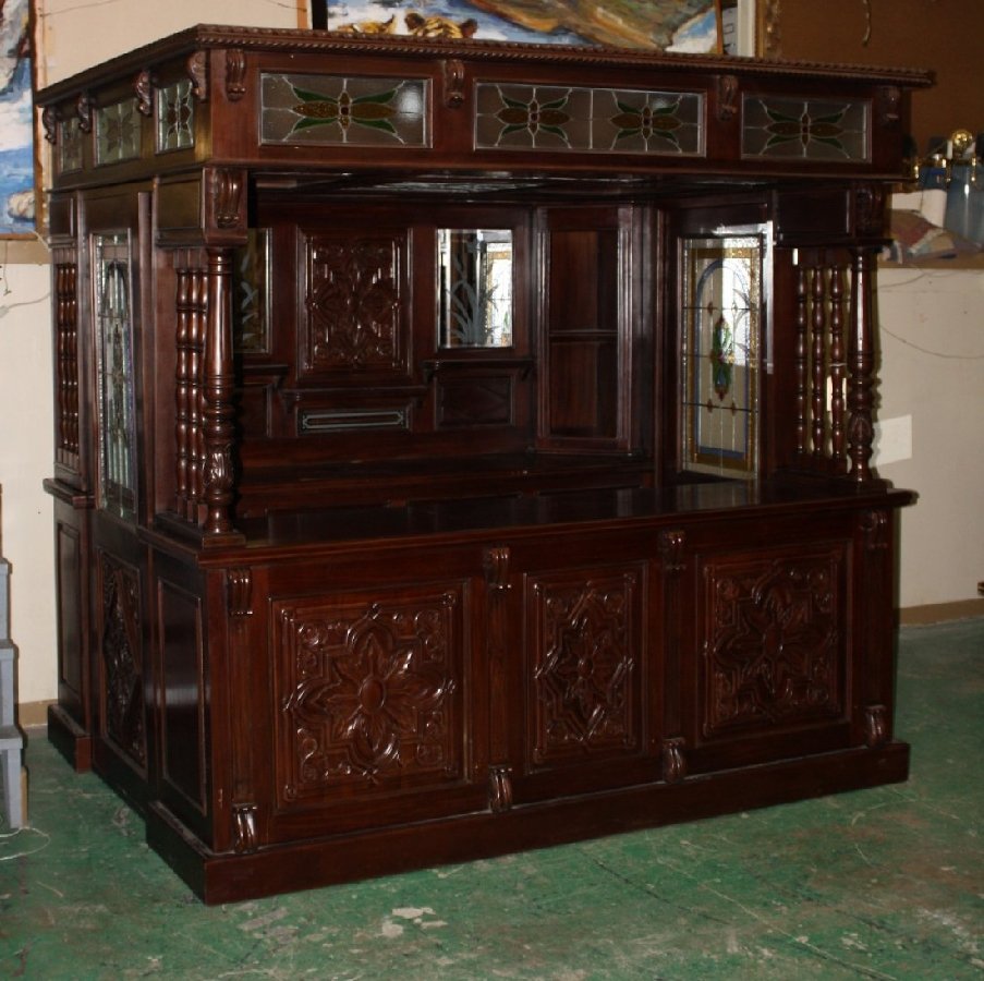 Carved mahogany canopy pub bar with floral detail: 98 1/2"w x 94 1/2"h x 72 1/4"d