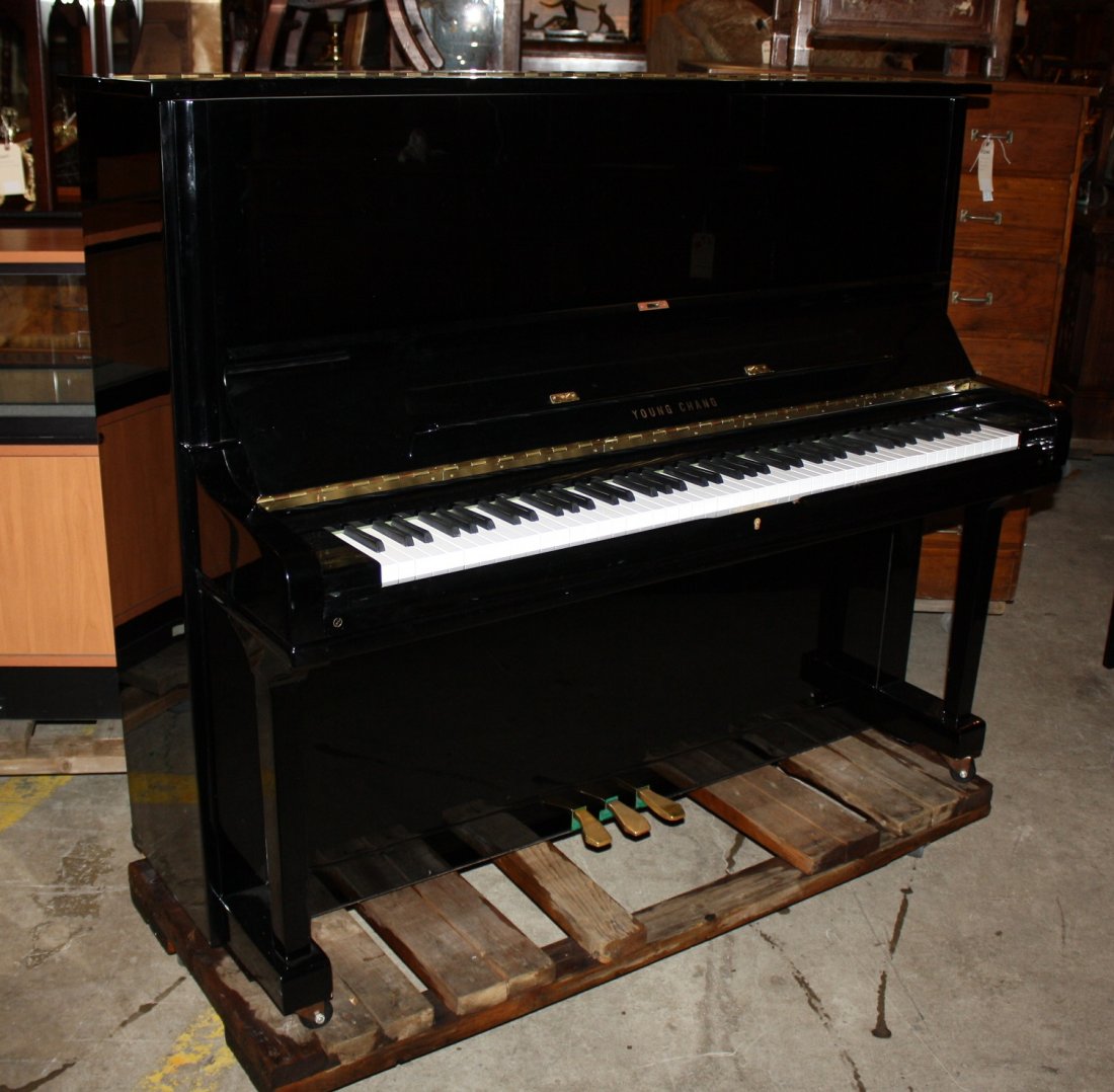 Young Chang 48" upright piano with bench: Black Lacquered case.
