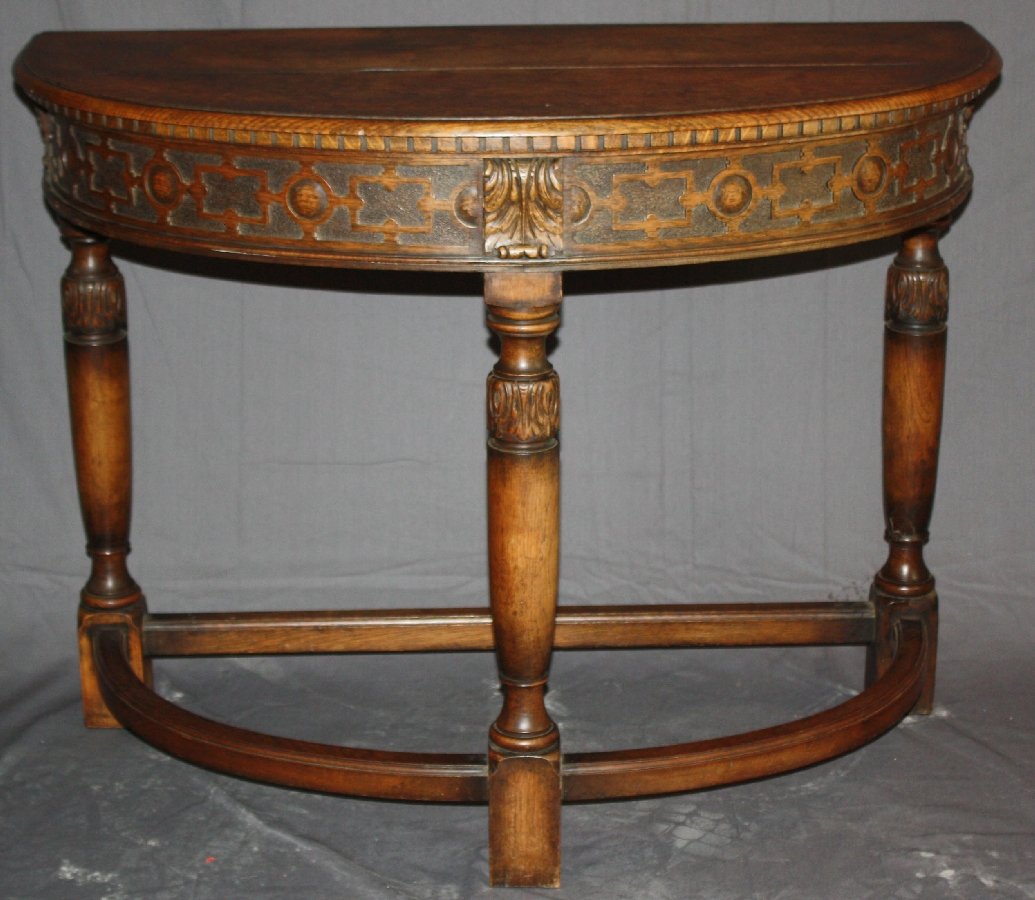 English Tudor demi-lune console table in carved oak: 32"h x 42"w x 20 1/2"d