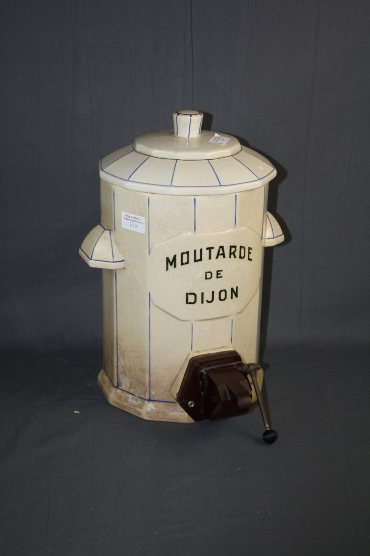 Faience French mustard pot Art Deco period: French faience mustard dispenser with Bakelite spigot. Circa 1920's. 15 1/2"h x 12 1/2"w x 12"d