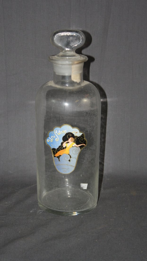 French pharmacy bottle from Lorenzy-Palanca Paris: Art Nouveau label Un Reve (A Dream). 13"h x 4 1/2"diam