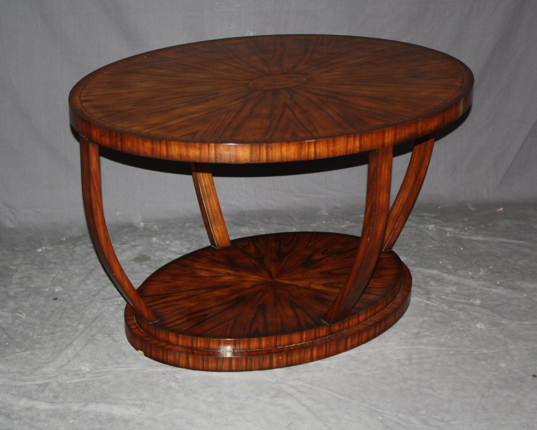 Art Deco style oval 2-tier coffee table with sunburst: Attributed to Theodore Alexander but not marked. 26"h x 44"l x 34"d