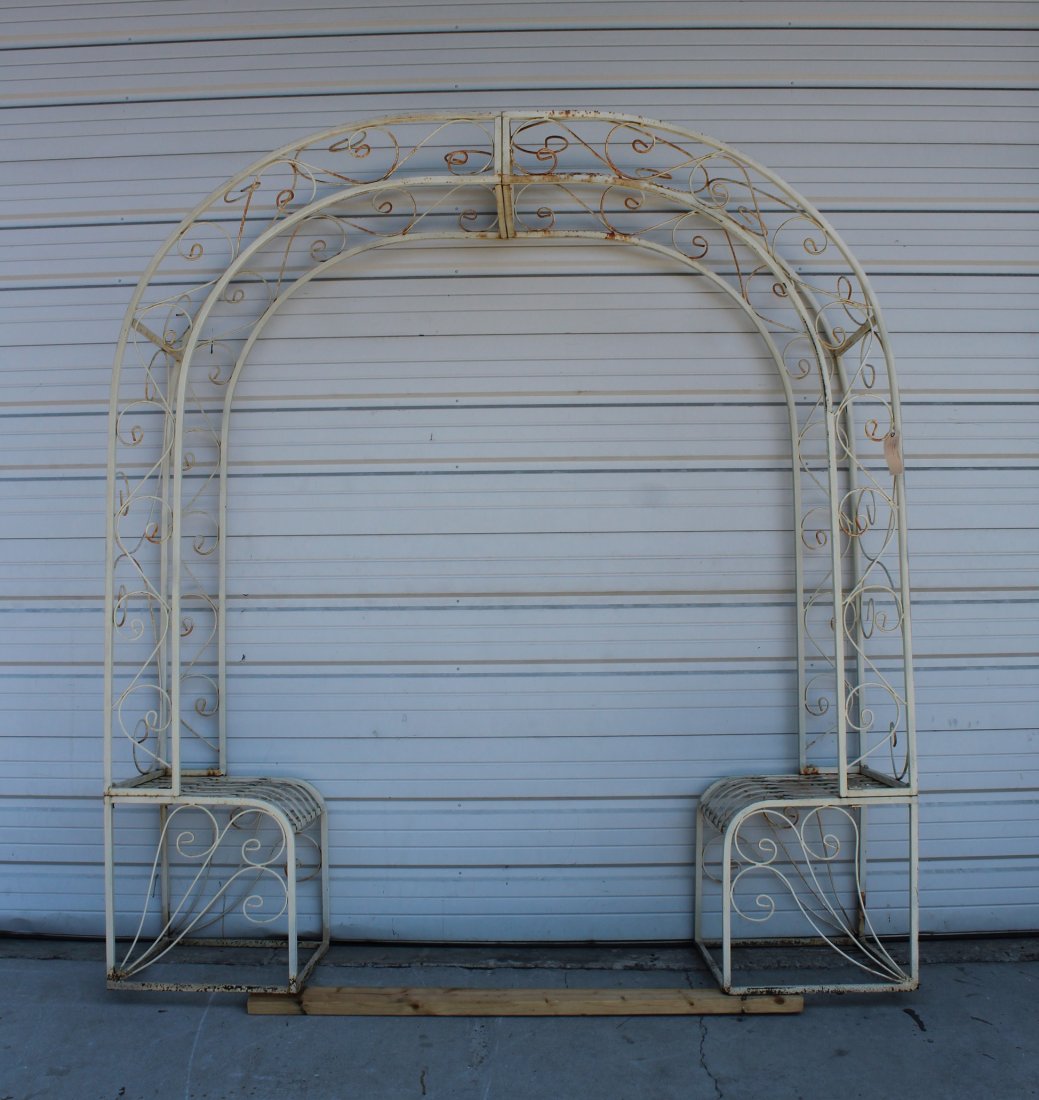 Scrolled iron garden arbor with bench seats (1 of 4)