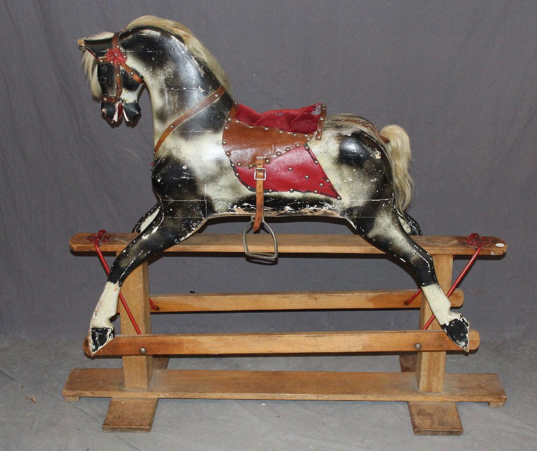 English dapple grey carousel horse on swing stand
