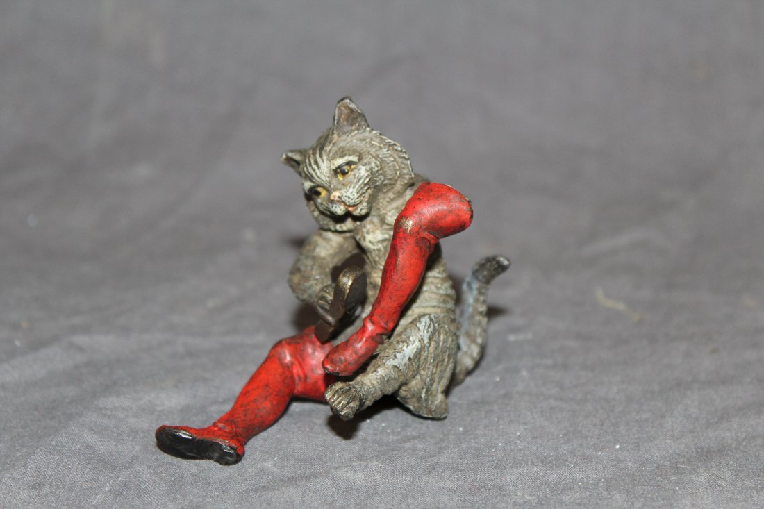 Austrian cold painted bronze 'Puss in Boots' figurine: Austrian cold painted bronze 'Puss in Boots' figurine. Marked with Bergman B on underside. 3"h