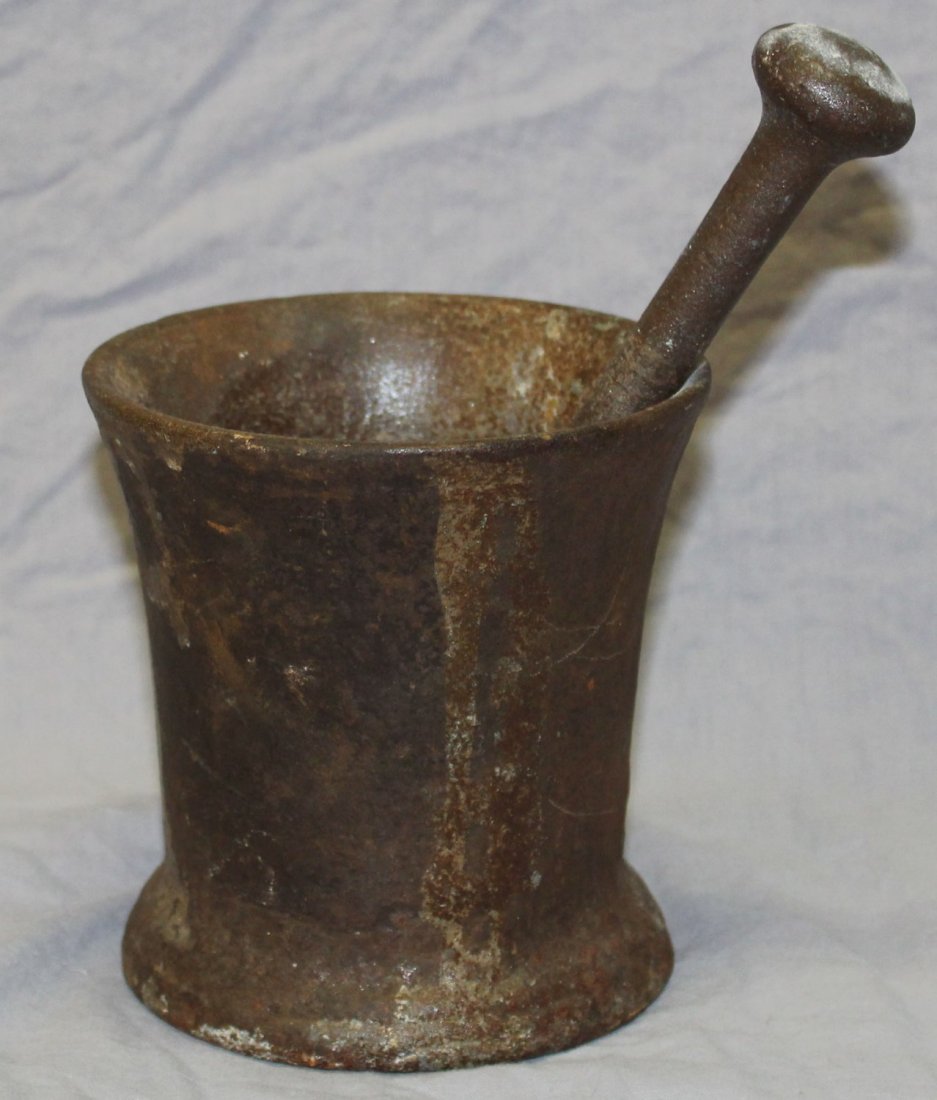 Antique iron mortar & pestle: Antique iron mortar & pestle. 5"h x 3.75"dia (pestle is 8"h)