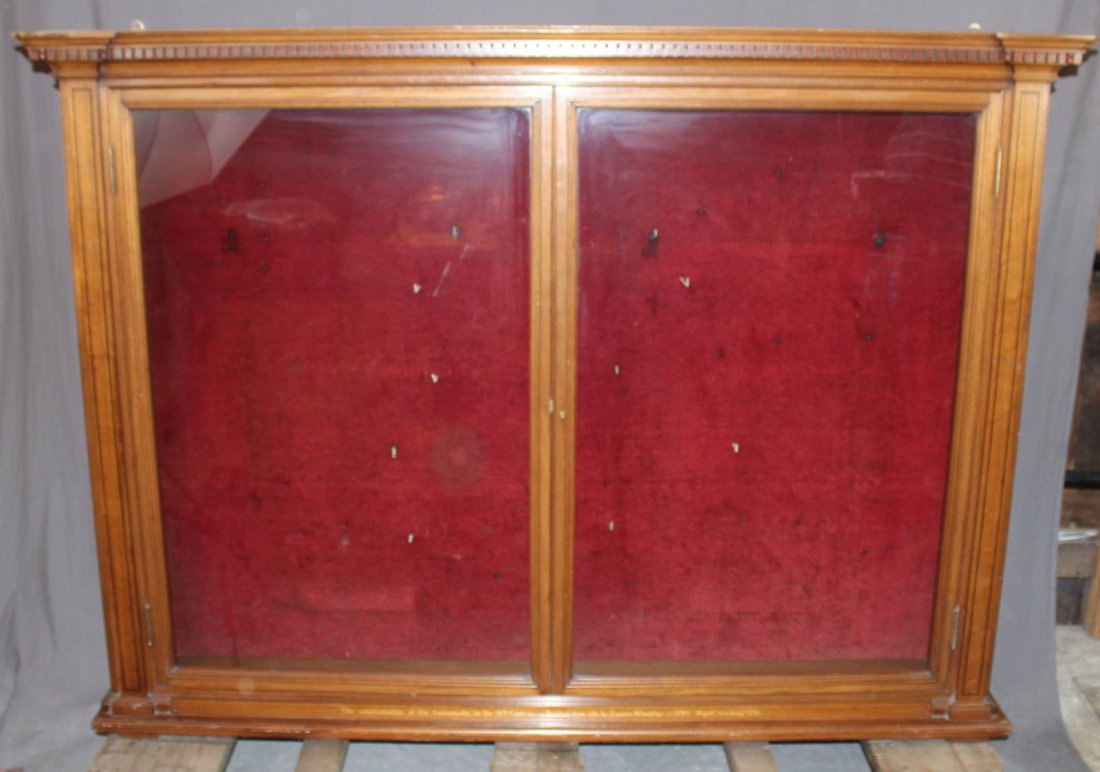 Glass door display cabinet in mahogany: Glass door display cabinet in mahogany marked on base "The administration of the sacraments on the 18thc. painted from life by Francis Wheatley c. 1790 Royal Academy 1791" 58"h x 79 1/4"w x 10 1/2"
