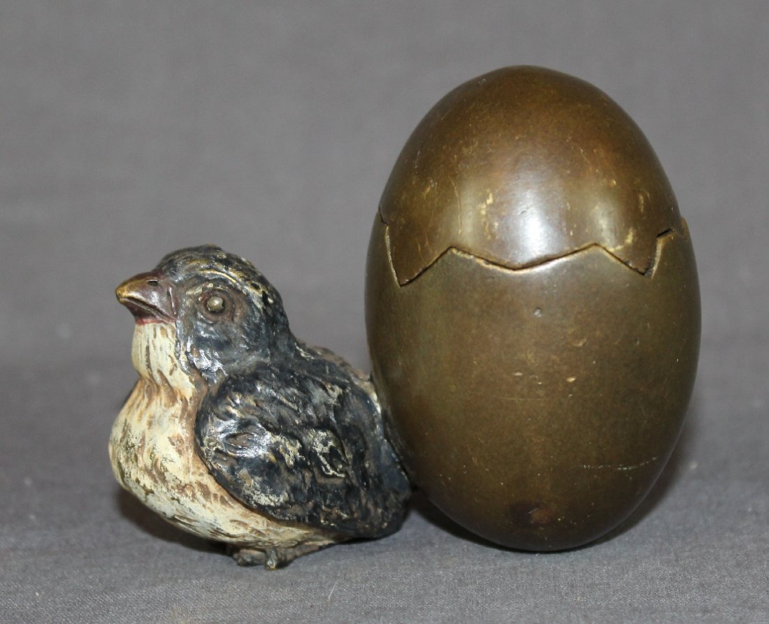 Cold painted bronze bird with egg (1 of 3)